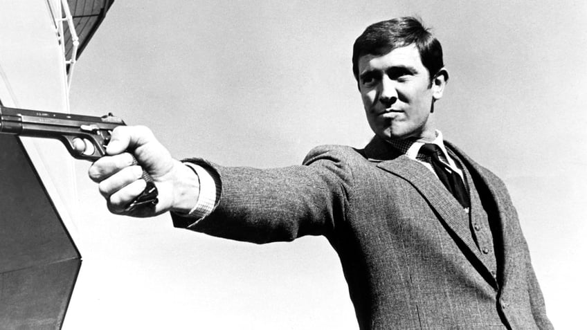 George Lazenby as James Bond