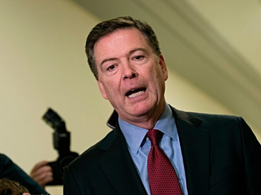 Former FBI Director James Comey talks to reporters following a closed House Judiciary Comm