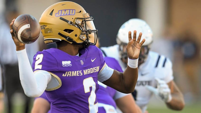 james madison football coaches pull out cellphone to get ref to overturn call