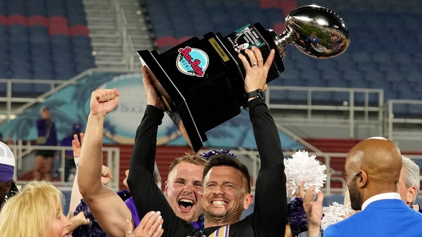 Bob Chesney holds the trophy