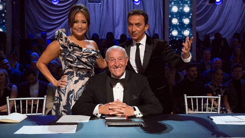 Carrie Ann Inaba, Len Goodman, and Bruno Tonioli at the Dancing with the Stars judging desk