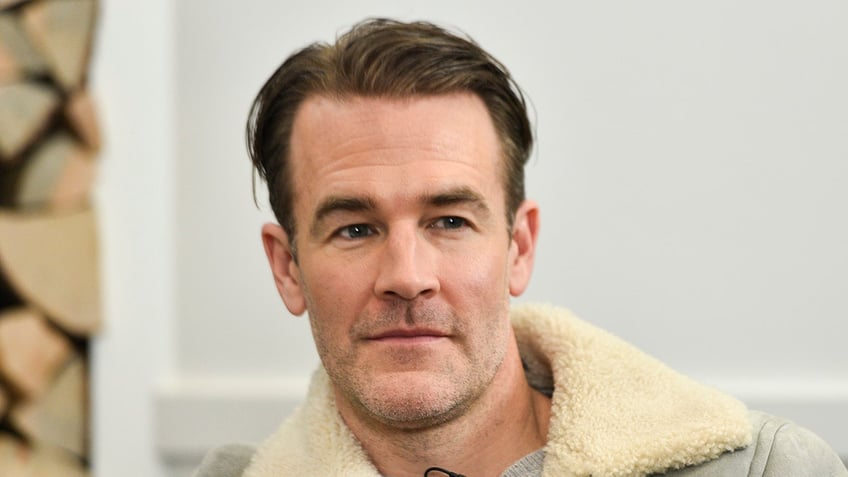 James Van Der Beek in coat