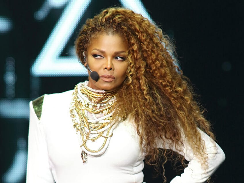 MIAMI, FL - SEPTEMBER 20: Janet Jackson performs on stage during her "Unbreakable&quo