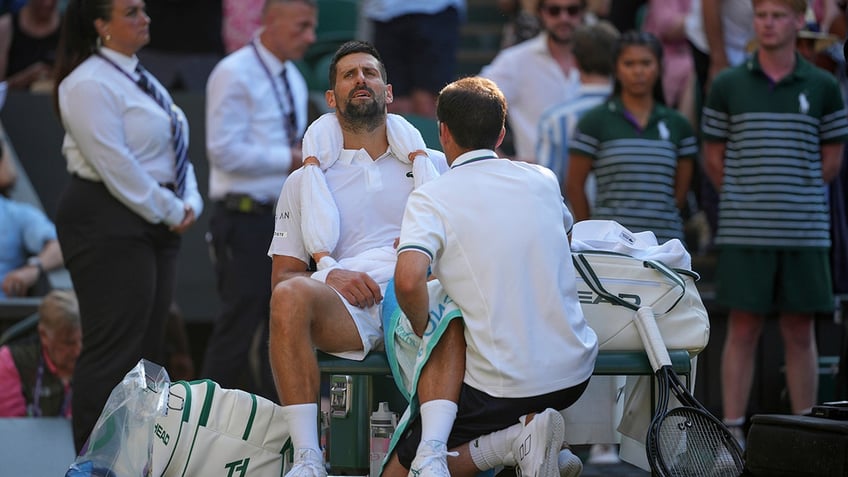 Novak Djokovic receives medical treatment