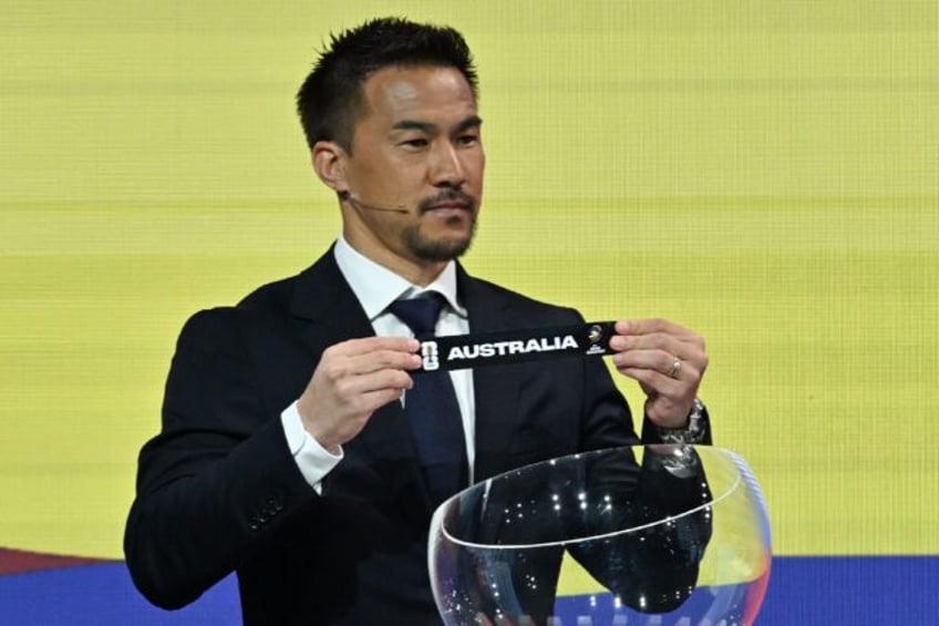 Japanese former footballer Shinji Okazaki helped conduct the draw