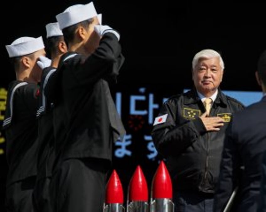 Japan defense minister boards S. Korean warship for first time to show military cooperatio