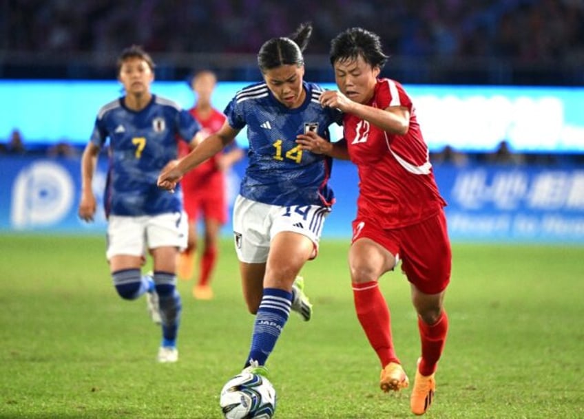 japan defy crowd to beat north korea for asian games football gold