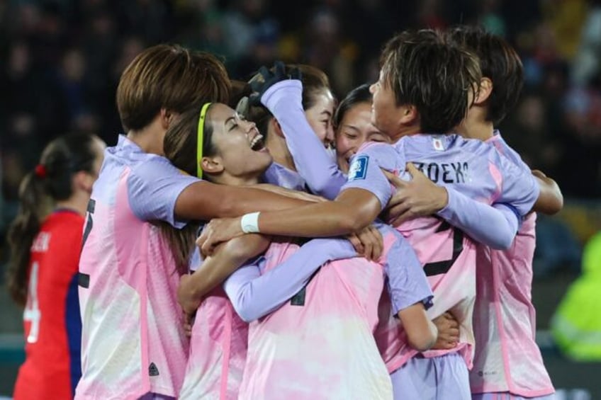 japan fly in under radar to make case for world cup glory