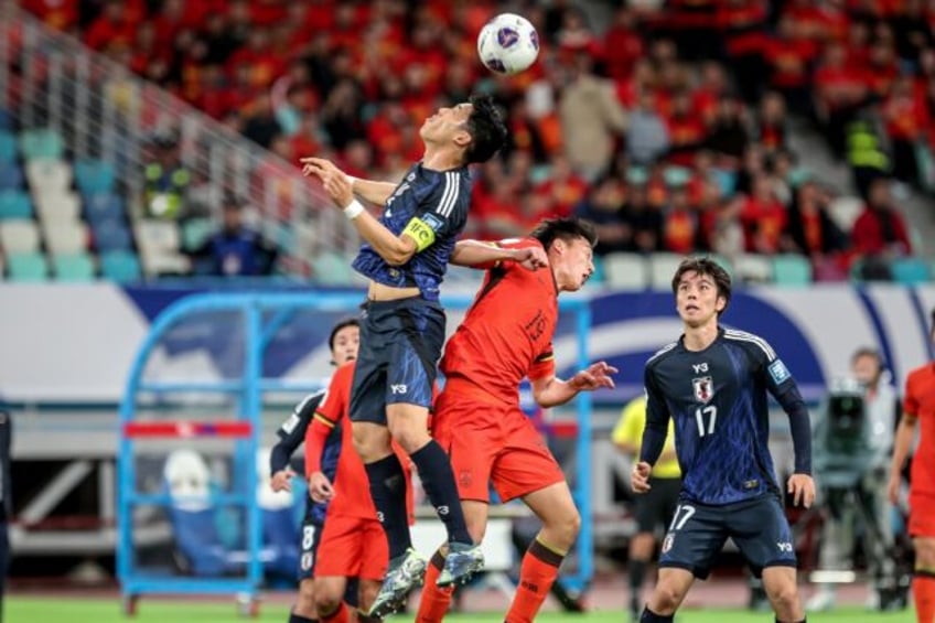 Japan (in blue) were 3-1 winners over China