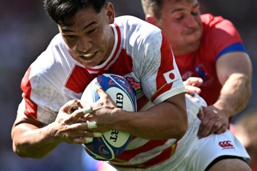 japan overpower debutants chile 42 12 in world cup opener