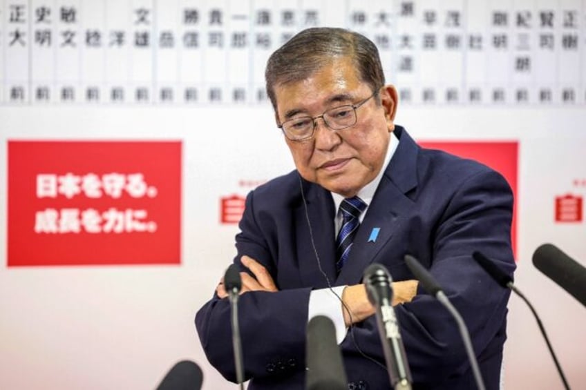 Japanese Prime Minister Shigeru Ishiba speaks at LDP headquarters during the country's gen