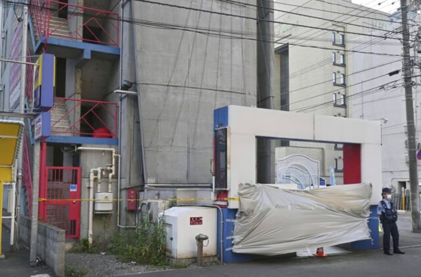 japan police arrest woman parents in beheading of man at hotel in hokkaido entertainment district