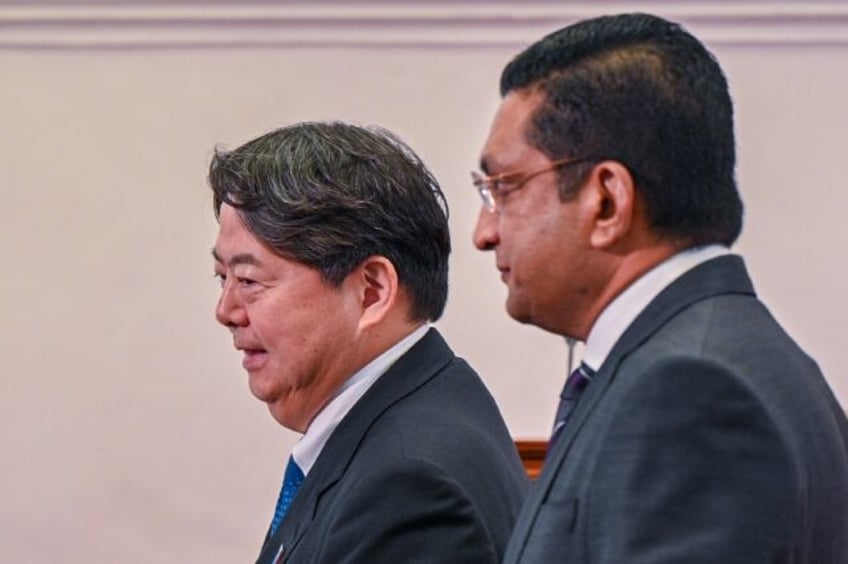 japan presses sri lanka to secure china debt deal