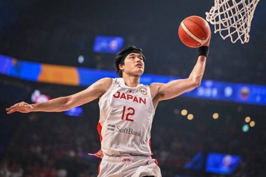 japan take pole position in basketball world cups olympic race