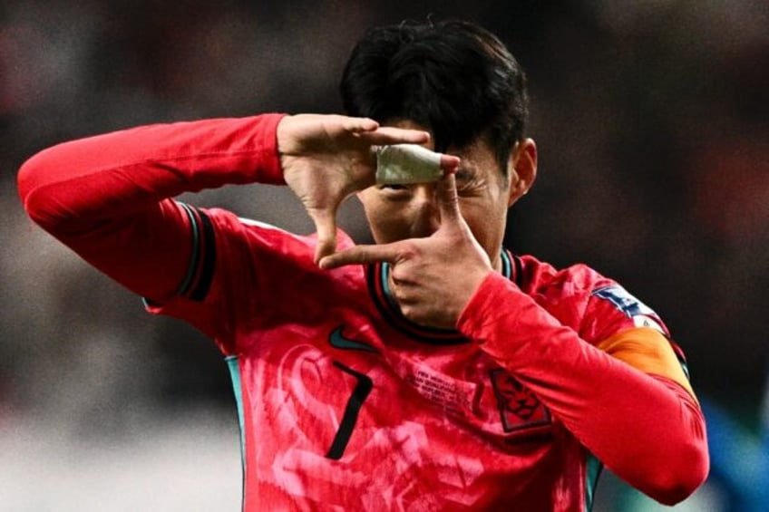 South Korea's captain Son Heung-min celebrates scoring against Thailand