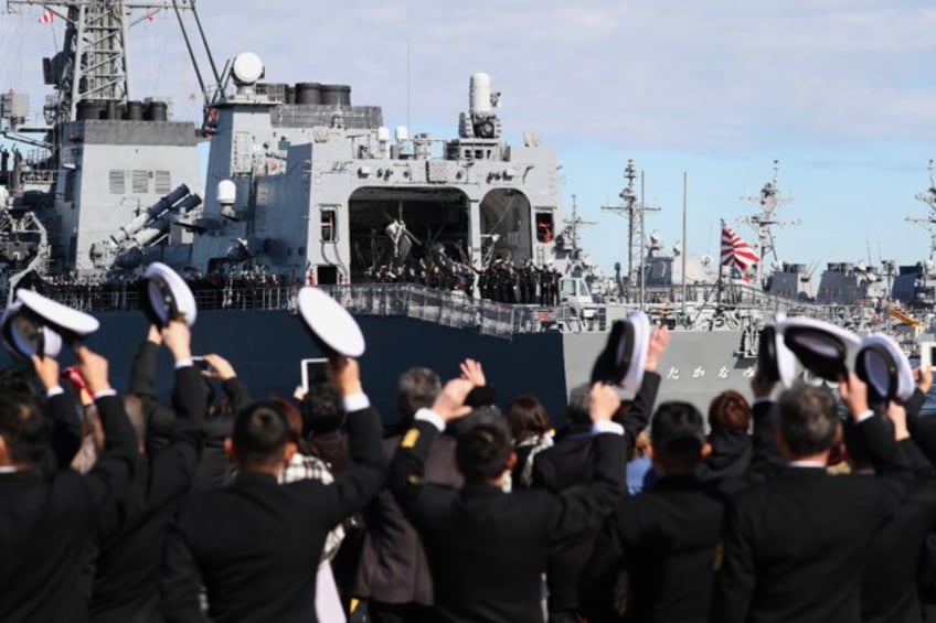 japan to hit record defense spending 53 billion sought for more missiles ships