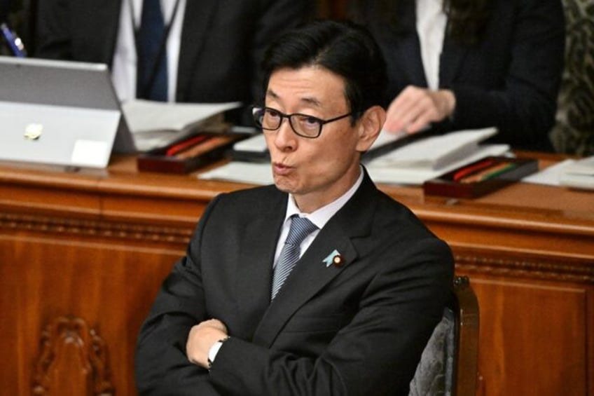 Japan's Economy, Trade and Industry Minister Yasutoshi Nishimura resigned over a major party financing scandal