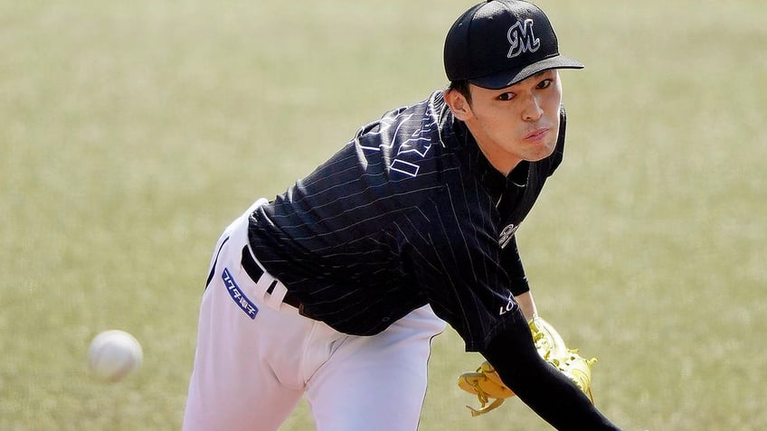 Roki Sasaki throws a pitch