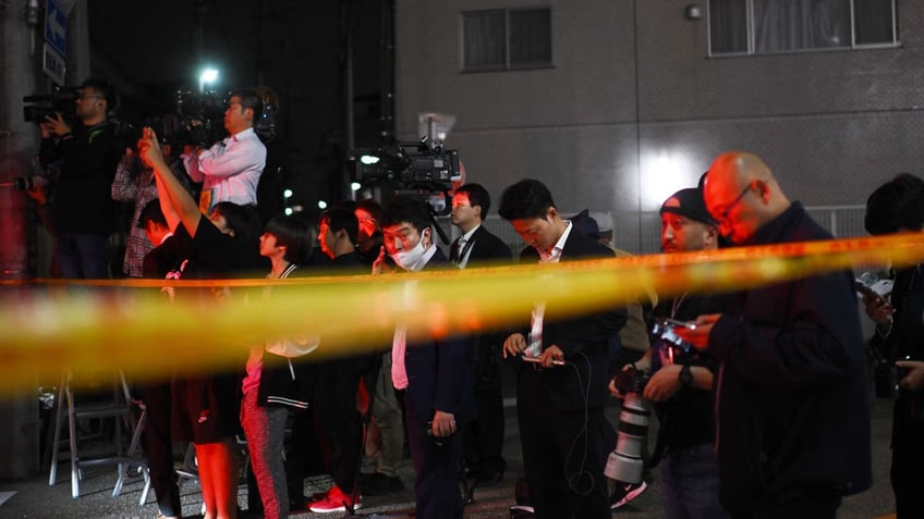 japanese police arrest octogenarian who shot 2 took hostage in hourslong standoff report