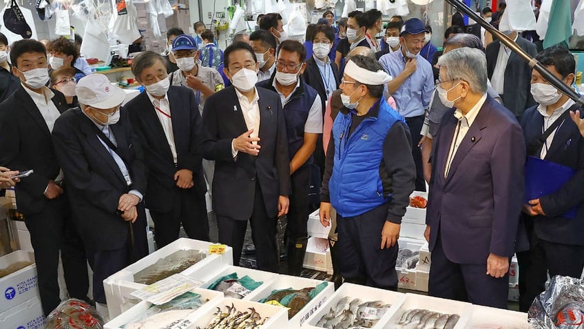 japanese prime minister eats fish from radioactive wastewater dump to demonstrate safety