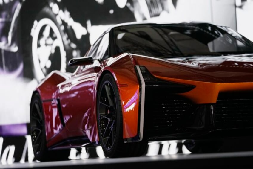 japans automakers unveil evs galore at tokyo show to catch up with tesla other electric rivals