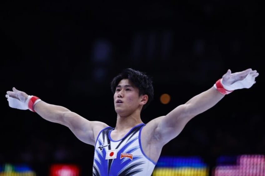 japans hashimoto extends reign as world all around champion