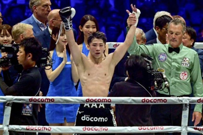 Japanese boxer Naoya Inoue celebrates his victory over Mexico's Luis Nery in their IBF-WB