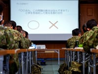 Japan's military struggles to recruit women following series of sexual harassment cases