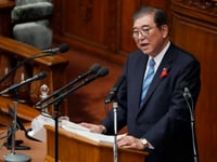 Japan’s new leader expresses regret for governing party slush fund scandal, vows stronger defense