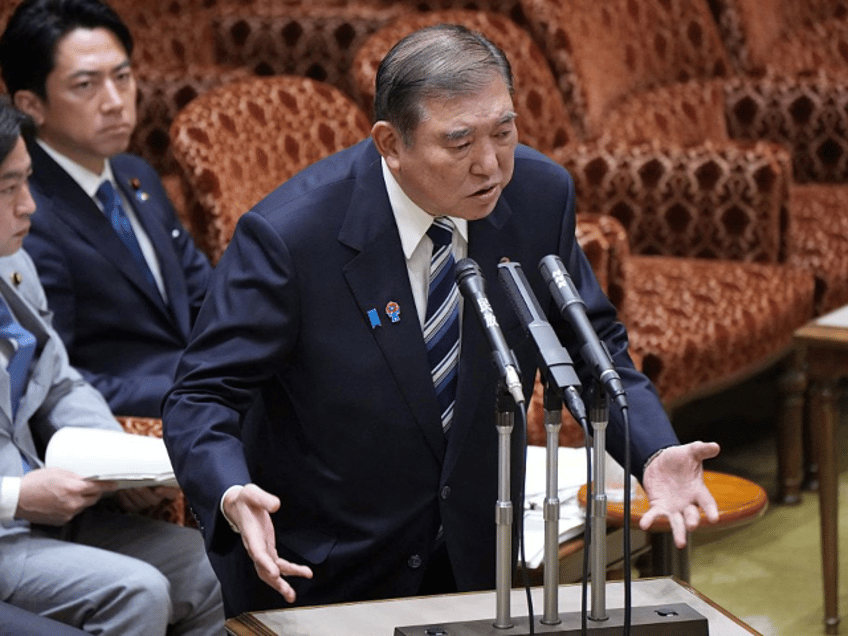 Japan's Prime Minister Shigeru Ishiba answers questions during a budget committee session