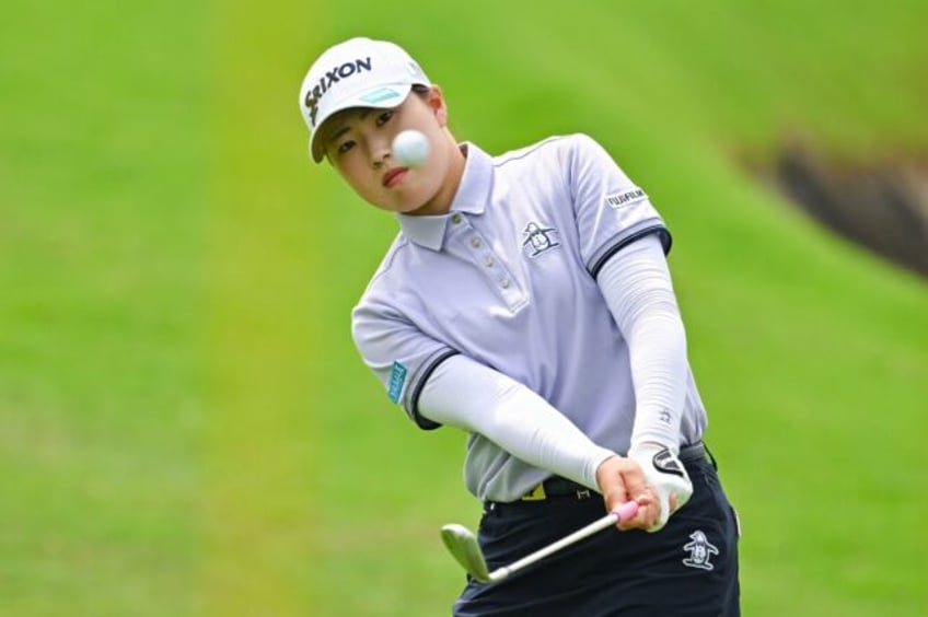 Japan’s Rio Takeda chips during the final round of the LPGA Blue Bay golf tournament at