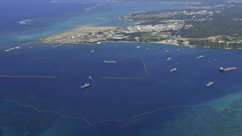 japans top court orders okinawa to allow a divisive government plan to build us military runways