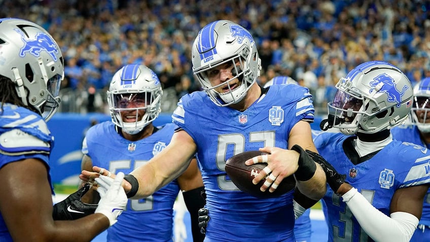 jared goff aidan hutchinson make major impact in lions win over panthers