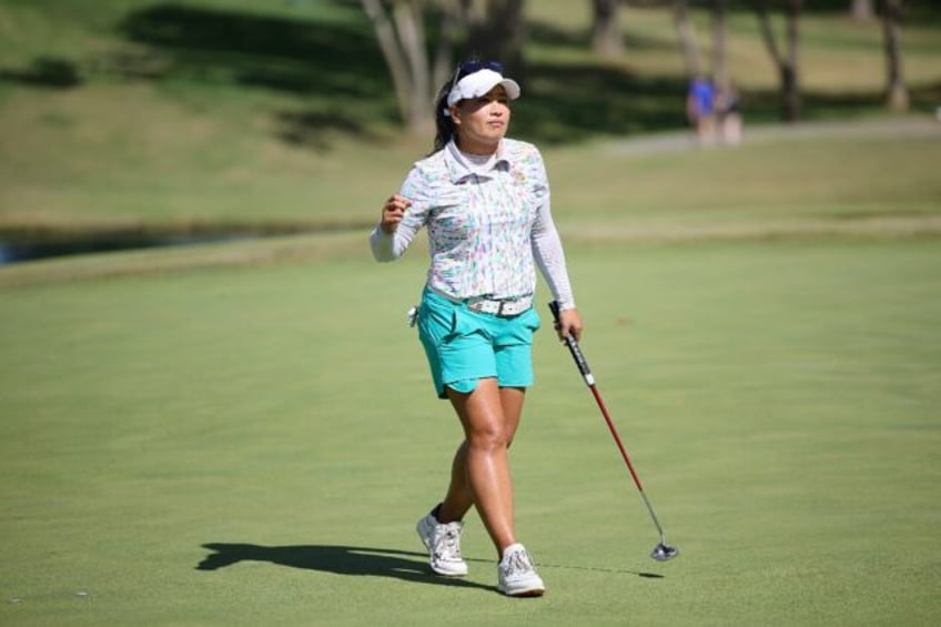 Thailand's Jasmine Suwannapura reacts to an eagle at the 72nd hole on the way to a playoff