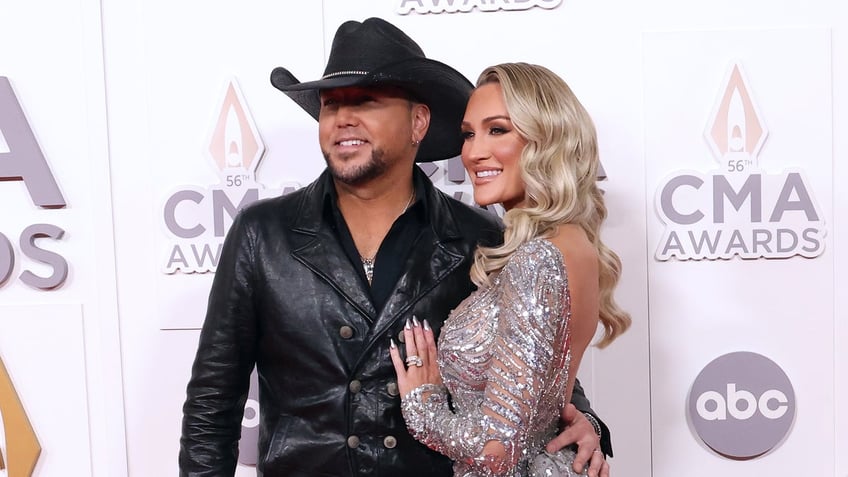 jason aldean says wife brittany gets fired up when defending him