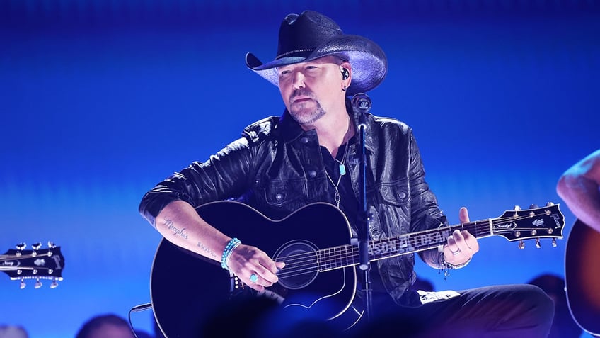 Jason Aldean performs on stage