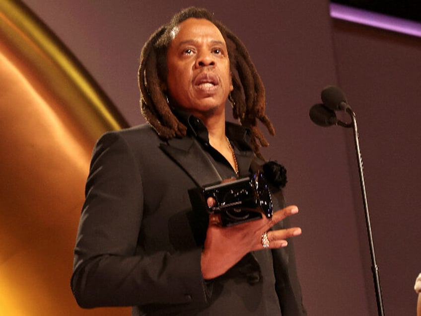 LOS ANGELES, CALIFORNIA - FEBRUARY 04: Jay-Z accepts the Dr. Dre Global Impact Award onstage with Blue Ivy Carter during the 66th GRAMMY Awards at Crypto.com Arena on February 04, 2024 in Los Angeles, California. (Photo by Johnny Nunez/Getty Images for The Recording Academy)