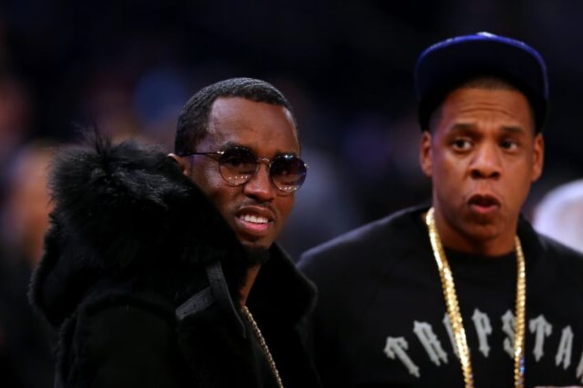 Rappers Sean Combs and Jay-Z, pictured at the 2015 NBA All-Star Game at Madison Square Gar