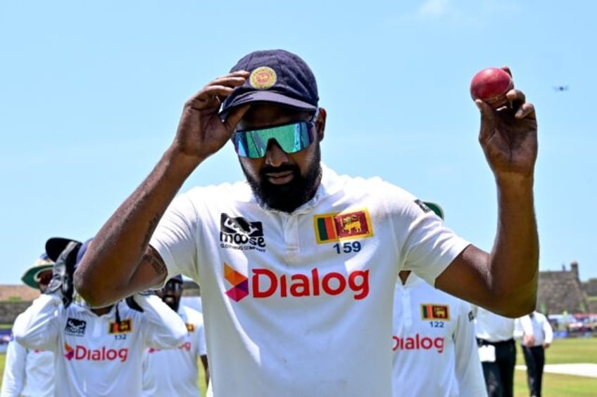 Sri Lanka's Prabath Jayasuriya celebrates his six wickets as New Zealand were 88 all out i