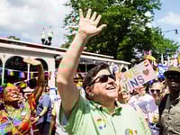 J.B. Pritzker Holds Baby at Chicago Pride March; Many Children Present at Event