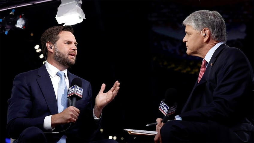 Republican Vice Presidential candidate, U.S. Sen. J.D. Vance (R-OH) (L) speaks to Fox News anchor Sean Hannity