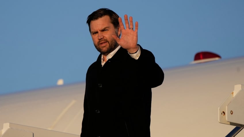 Vice President JD Vance waves as he arrives on Air Force Two Monday, Jan. 27, 2025, Joint Base Andrews, Md.