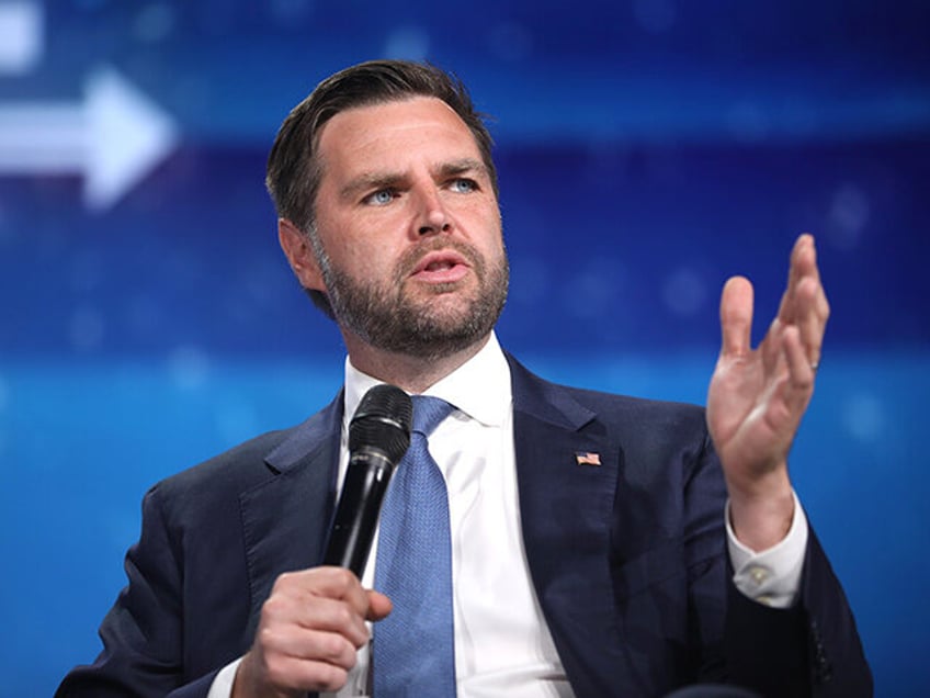 Republican vice presidential nominee and U.S. Senator J. D. Vance speaking with attendees