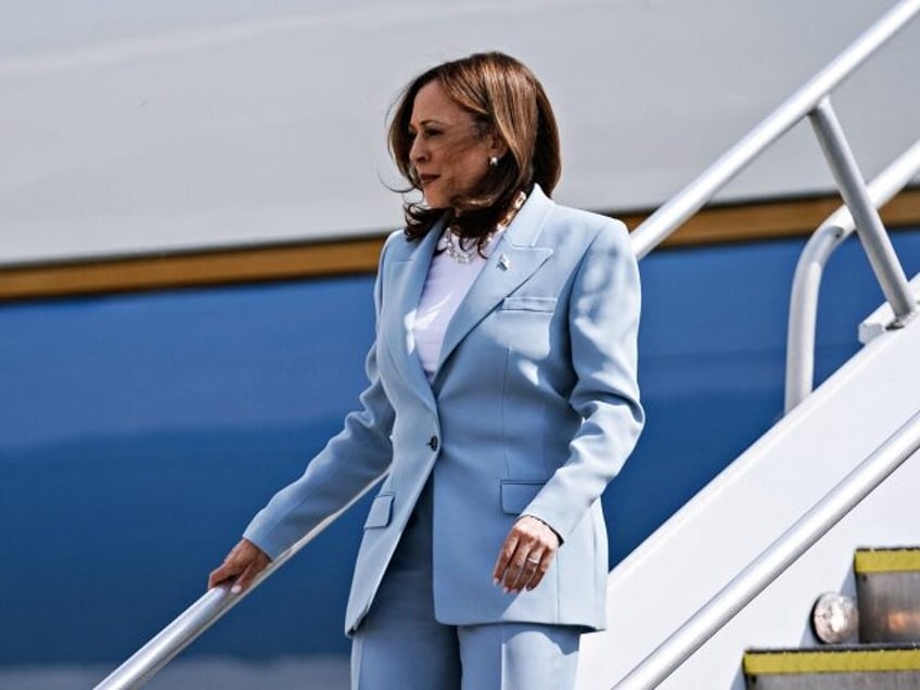 US Vice President and 2024 Democratic presidential candidate Kamala Harris steps off Air F