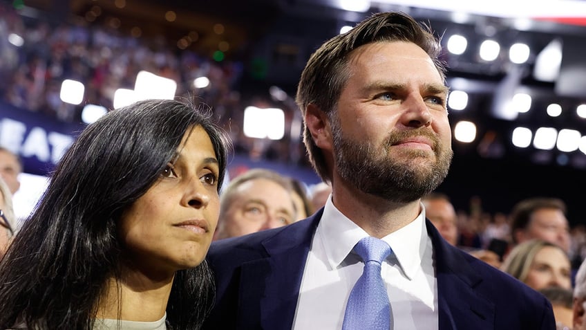 JD Vance and his wife Usha Vance arrive the first day of the 2024 Republican National Convention at the Fiserv Forum in Milwaukee, Wisconsin