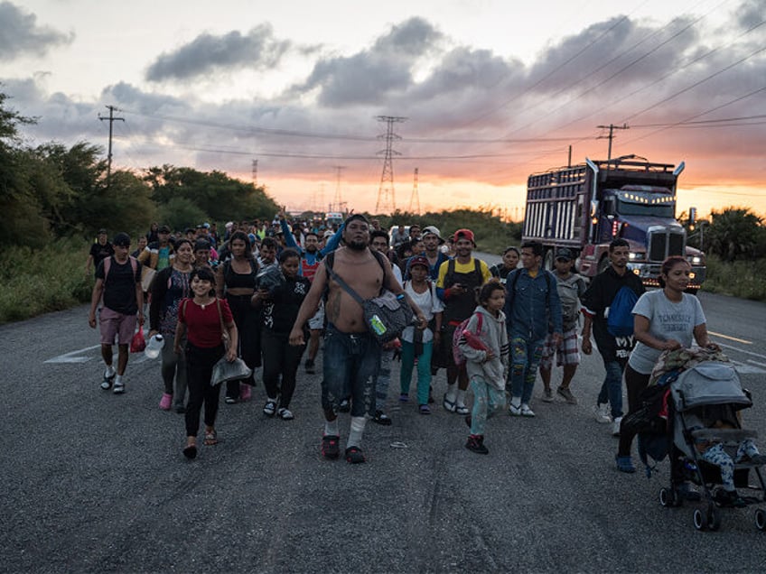 LA VENTA, MEXICO - OCTOBER 22: Hundreds of migrants are heading in a migrant caravan calle