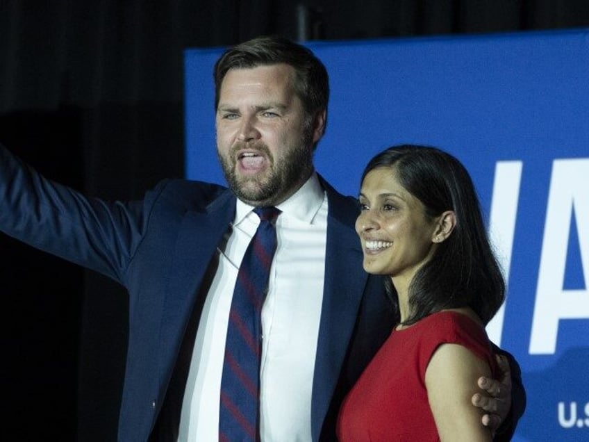 Republican U.S. Senate candidate J.D. Vance and his wife Usha Vance wave to supporters aft