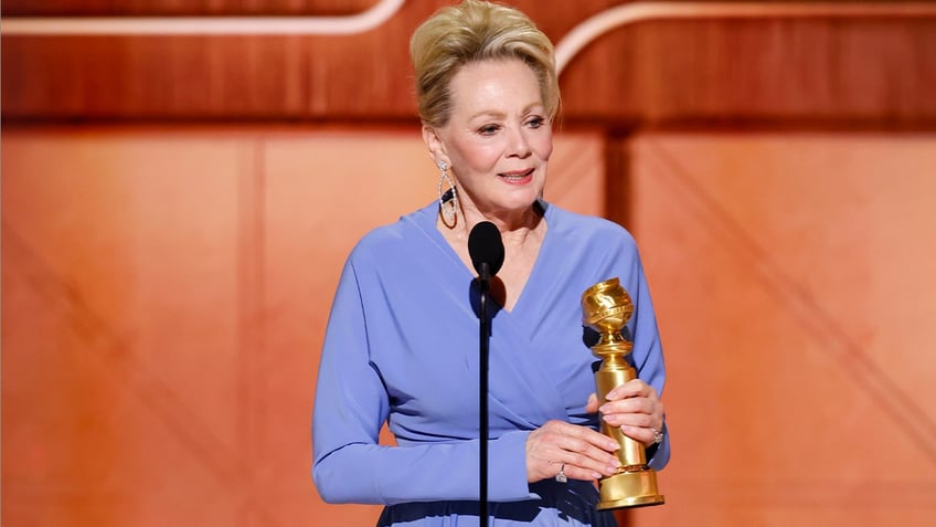 Jean Smart on stage with Golden Globe