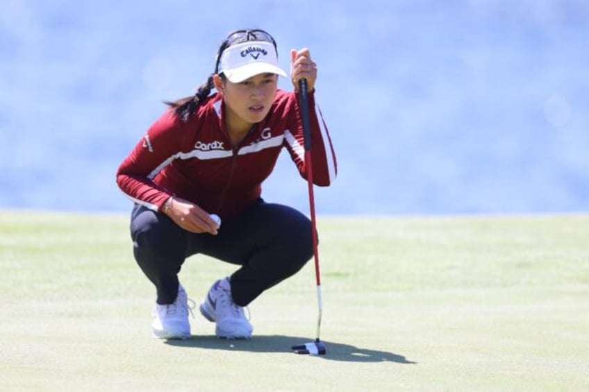 Thailand's Jeeno Thitkul lines up a putt on the way to the 54-hole lead at the LPGA Mizuho