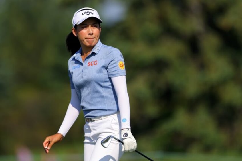 Thailand's Jeeno Thitikul eyes a shot on the way to the first-round lead in the LPGA Mizuh